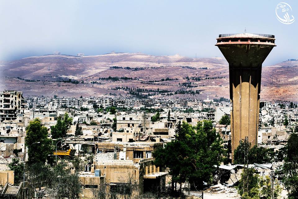 بالصور.. بدء عملية الاجلاء من داريا المحاصرة بسوريا