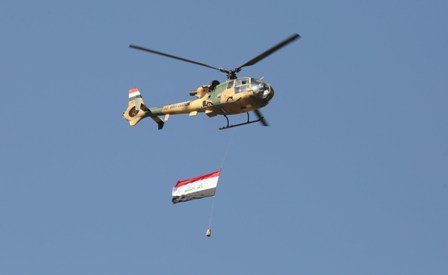 بالصور.. استعراض عسكري في قلب بغداد