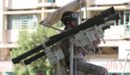 بالصور.. استعراض عسكري في قلب بغداد