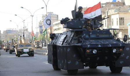 بالصور.. استعراض عسكري في قلب بغداد