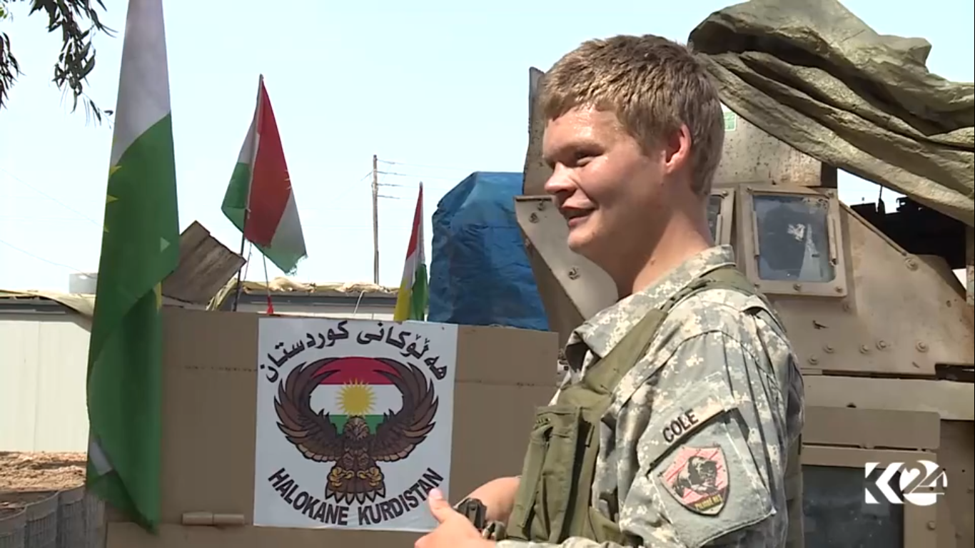 مقاتل امريكي بصفوف البيشمركة نافيا شائعات داعش: مازلت حياً