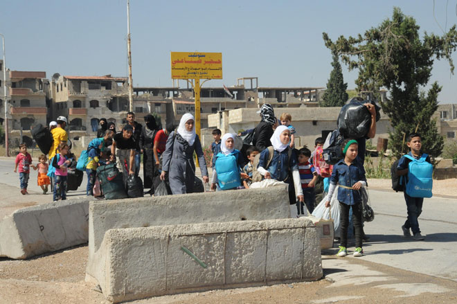بالصور.. اجلاء العشرات من المعضمية بموجب 