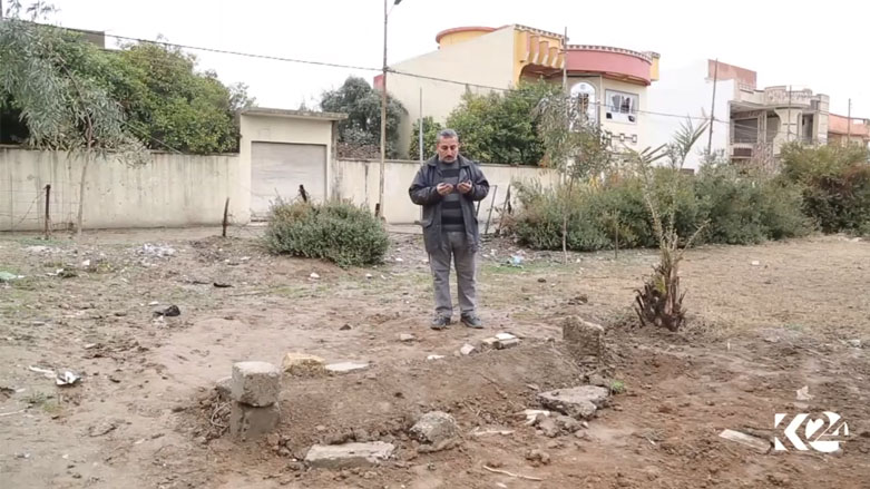 VIDEO: Mosul woman stays home, husband buried across from house