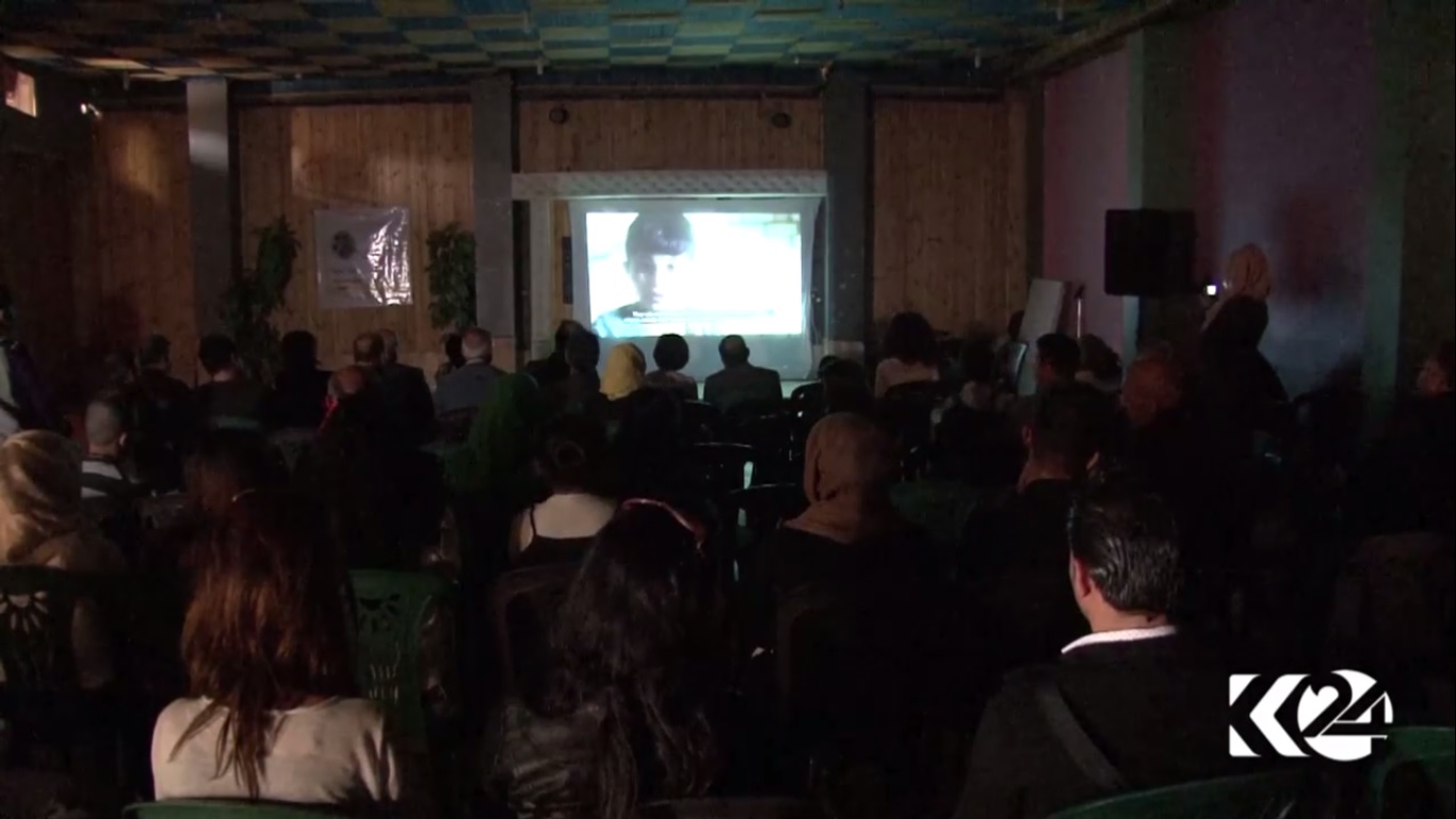 An audience watches a film on the Syrian children refugees amid war at the first International Film Festival in Qamishlo city, Rojava, Syria, April 19, 2017. (Photo: Kurdistan24)