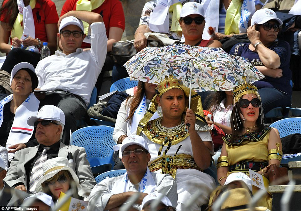 Worshippers dressed like Ancient Egyptians were in the stadium for the Pope's address (Photo: AFP)