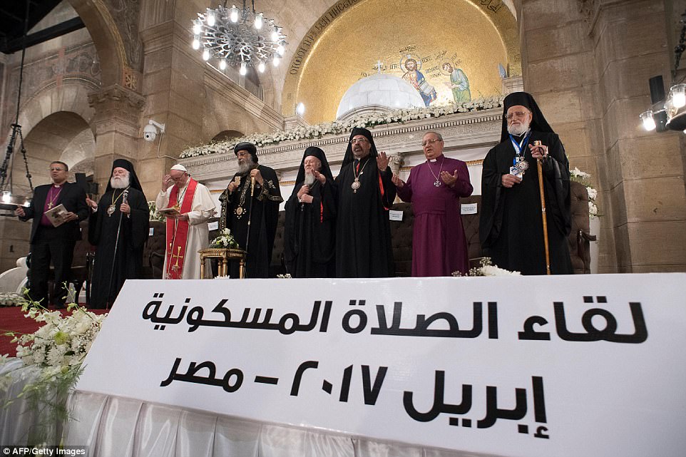 Pope Francis (third left) and Pope Tawadros II (fourth left), spiritual leader of Egypt's Orthodox Christians at a Cairo church. (Photo: AFP)