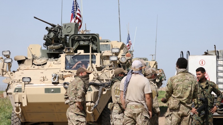 US troops and tanks with Kurdish fighters in nortern Syria, April 2017. (Photo: Reuters)