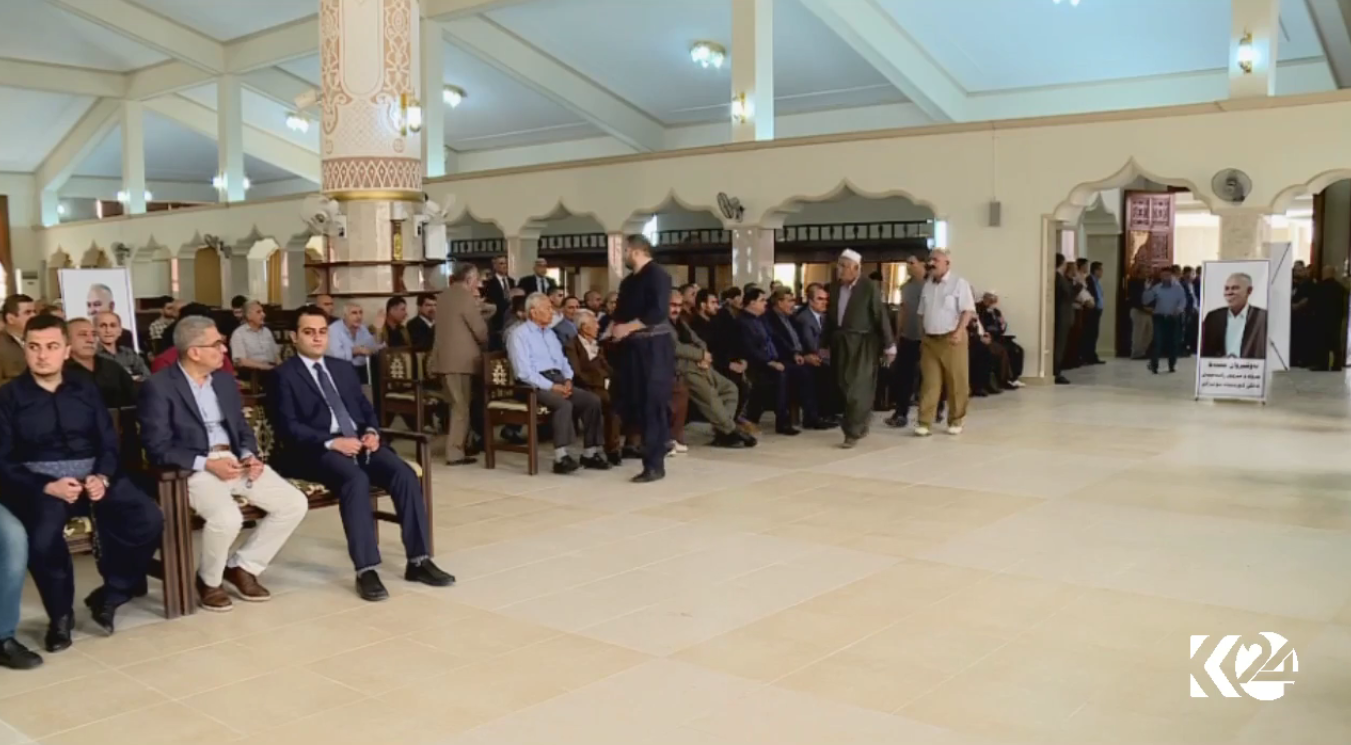 People attend Nawshirwan Mustafa's funeral at Ahmed Haji Ali mosque in Sulaimani.
