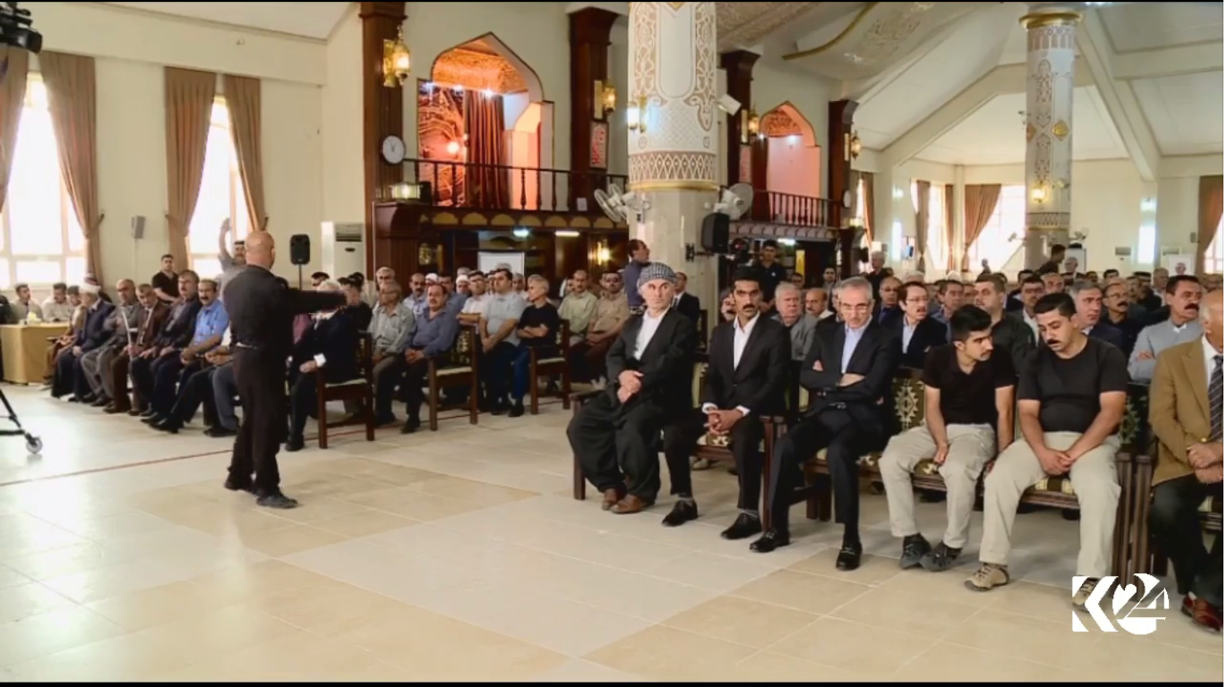 People attend Nawshirwan Mustafa's funeral at Ahmed Haji Ali mosque in Sulaimani.