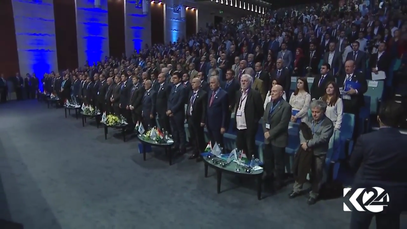 Standing a moment of silence for the Kurdistan national anthem. (Photo: Kurdistan24)