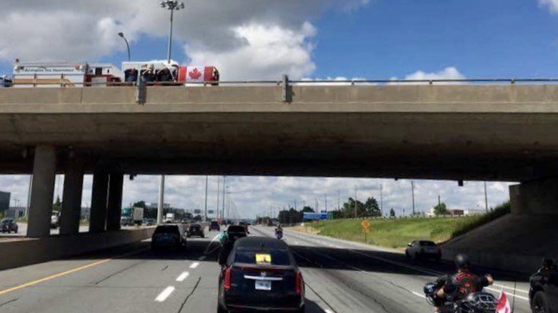 Nazzareno Tassone's body was taken to his burial site in Niagara Falls, traveling on the Highway of Heroes in Toronto, Canada, June 21, 2016. (Photo: Twitter)