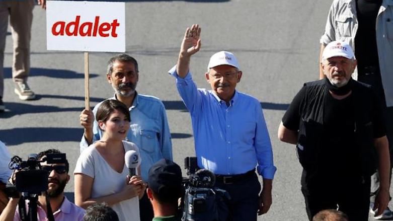 Turkish main opposition Republican People's Party (CHP) leader Kemal Kilicdaroglu greets his supporters during the second day of a protest, dubbed as 