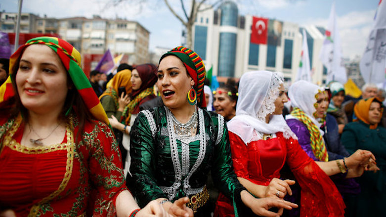 Kurdish women dance during a Newroz celebration in Istanbul, Turkey, March 21, 2017. (Reuters)