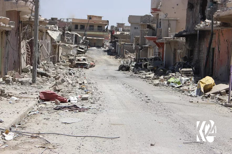 بە وێنە... شەڕ و وێرانكاری گەڕەكێكی مووسڵ