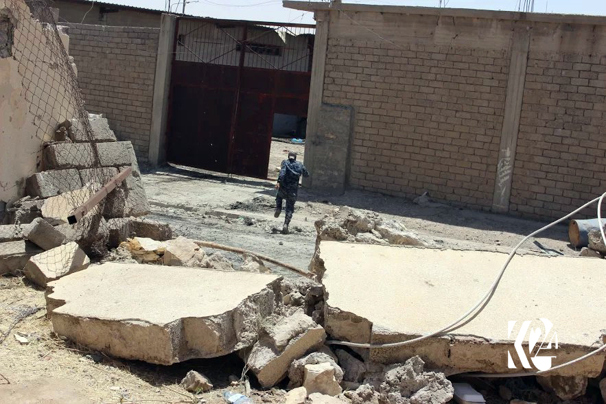 بە وێنە... شەڕ و وێرانكاری گەڕەكێكی مووسڵ