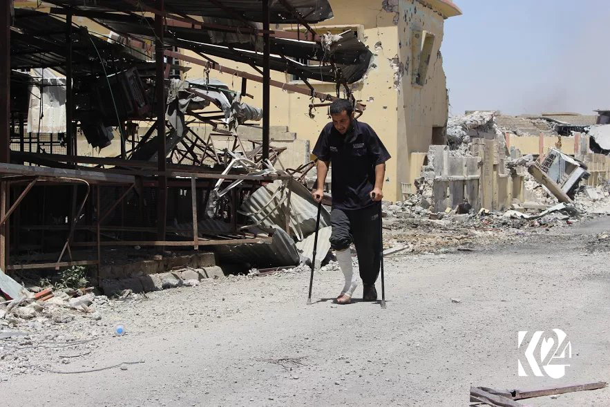 بە وێنە... شەڕ و وێرانكاری گەڕەكێكی مووسڵ