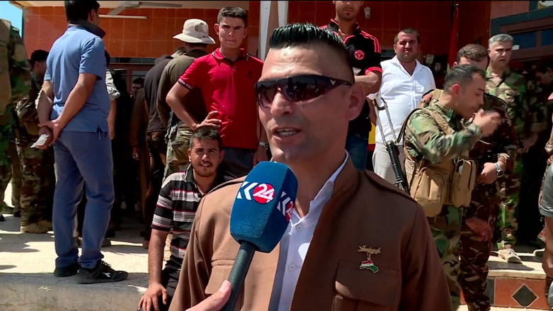 An Arab resident of Makhmour wears a traditional Kurdish outfit with Kurdistan flag pin on his chest, July 31, 2017. (Photo: Kurdistan 24)