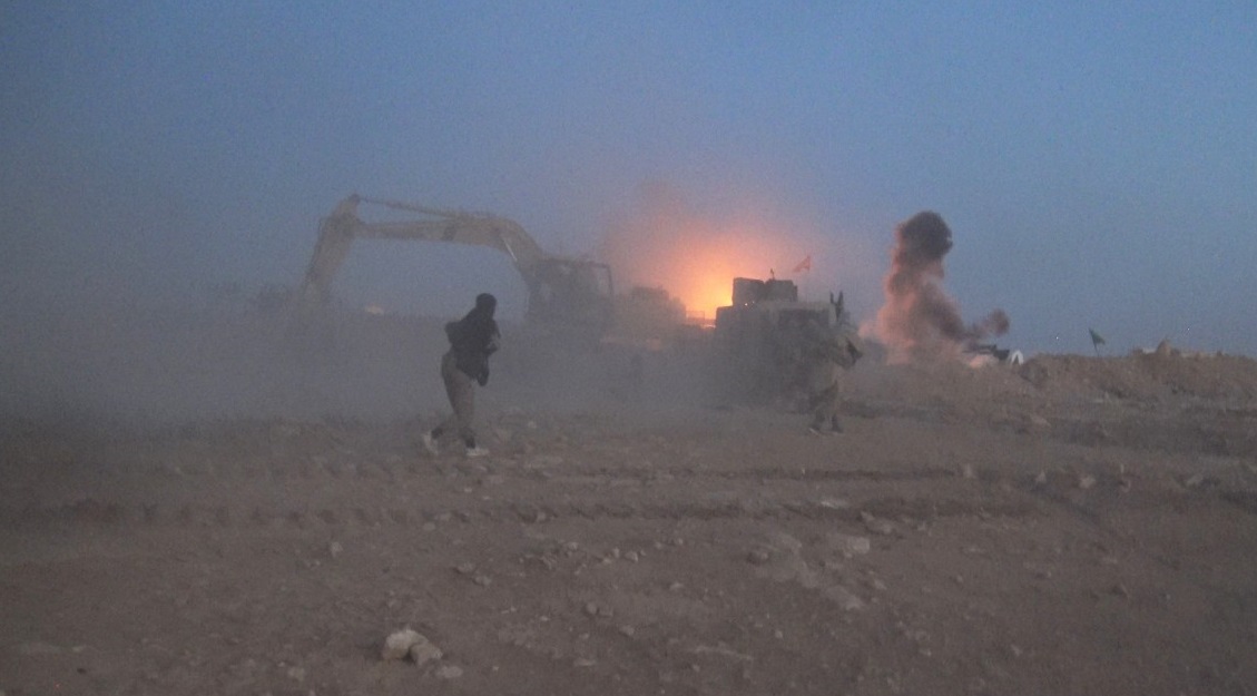 IS attack on Hashd al-Shaabi position.