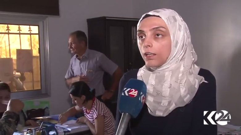 روكن ملا ابراهيم الرئيسة المشتركة للمفوضية العليا للانتخابات بمقاطعة الجزيرة
