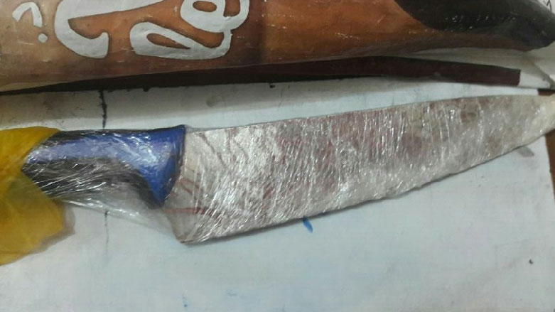 عثر على هذه السكين في موقع الجريمة - صورة من شرطة ذي قار