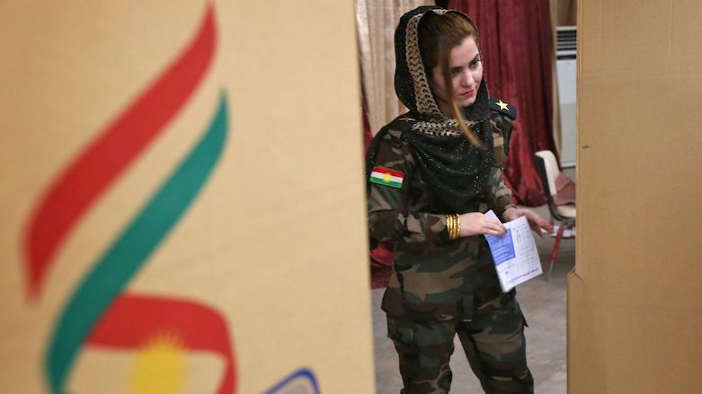 A member of Kurdistan Region's Peshmerga army casts her vote at a polling station in capital Erbil, Sept 25, 2017. (Photo: AFP)