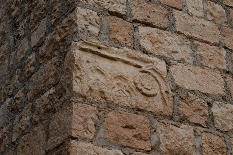 Ruined reliefs, perhaps from destroyed predecessors of the current shrine, are woven throughout