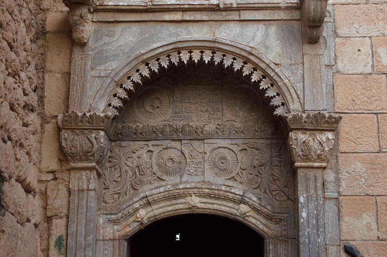Detail of the doorway and the maker’s inscription