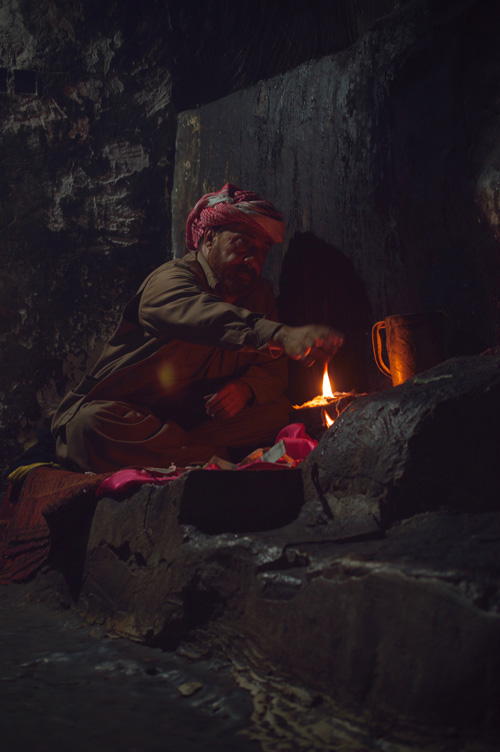 Caretaker lighting first lamp on Ezidi New Year