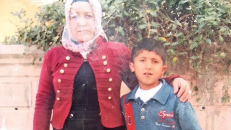 Child victim of a PKK bomb in 2015, Firat Simpil, seen with his mother in this undated picture. (Photo: Simpil Family)