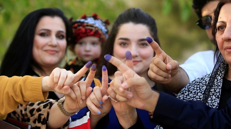 Women show their ink-stained fingers following a vote in the Kurdistan Region's independence referendum, Sep. 25, 2017.