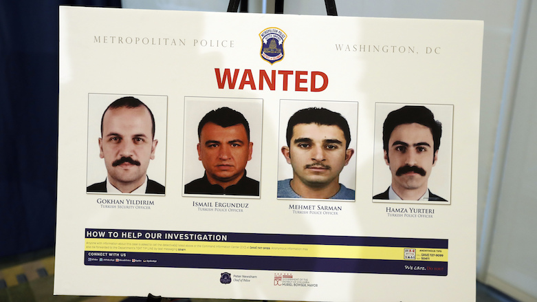 Wanted posters for members of Erdogan's security detail facing criminal charges seen after a DC police news conference in Washington, Thursday, June 15, 2017. (Photo: AP)