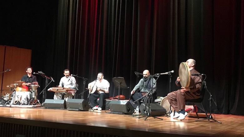 Hajar Zahawy (R) plays the daf during his group's performance at the Aga Khan Museum in Toronto, Canada, Sep. 29, 2017. (Photo: Hajar Zahawy)