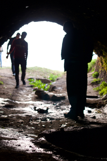 Located on a hill across from the valley is an ancient Zoroastrian temple cave, with a spring that flows from an altar.