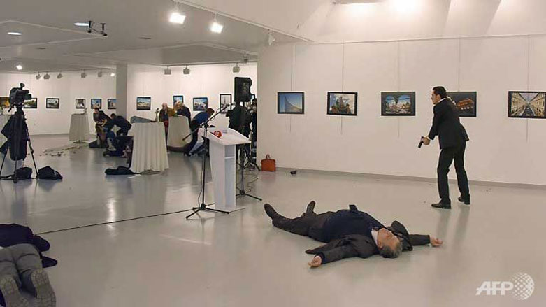 This picture shows Andrey Karlov, the Russian Ambassador to Ankara, lying on the floor after being shot by an off-duty Turkish police officer in an art gallery in Turkey's capital, Dec. 19, 2016. (Photo: AFP)