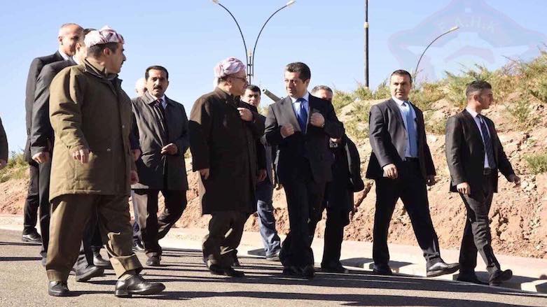 Former Kurdistan Region President Masoud Barzani (C-L) speaks with Kurdistan Region Security Council (KRSC) Chancellor Masrour Barzani during a visit to the Counter-Terrorism Department, Dec. 13, 2017. (Photo: KRSC Press)