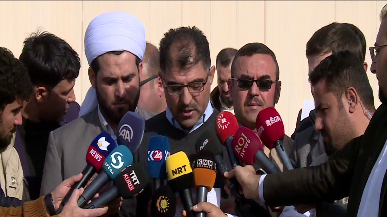 ئاوارەکانی خورماتوو لەبەردەم UN ماندەگرن