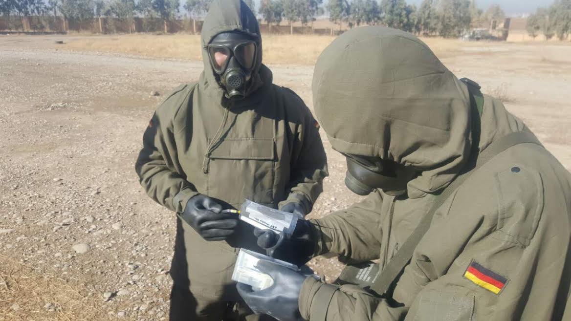 German advisers train a Peshmerga fighter from the chemical defense division.