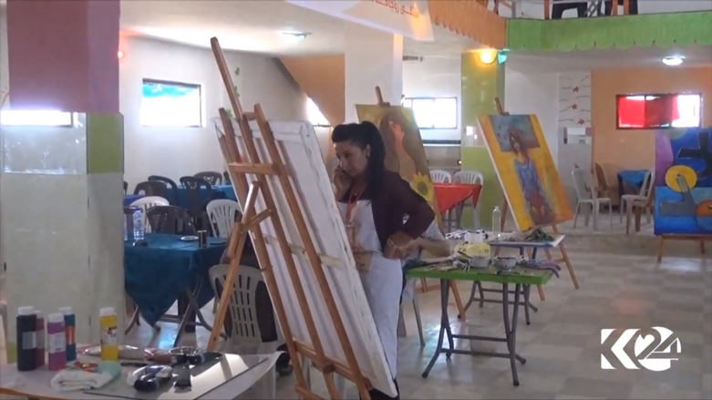 كوباني بريشة الفنانين في معرض بمشاركة كوردية واسعة