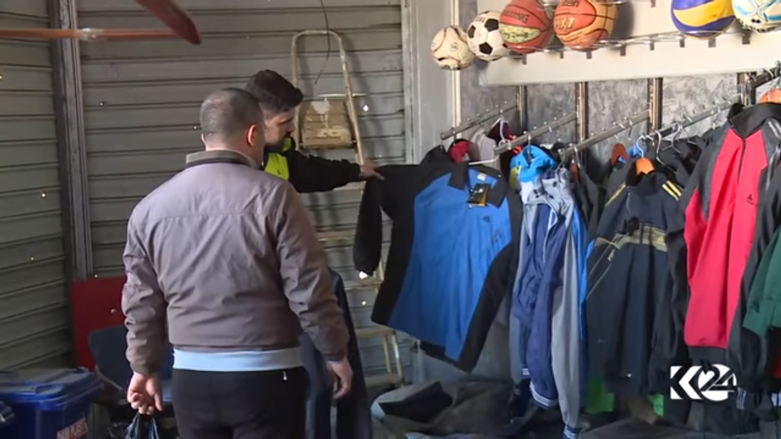 بالصور.. اقبال على شراء الالبسة الرياضية في الموصل بعد حرمان