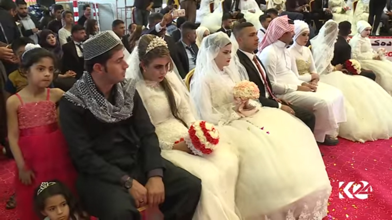 بالصور.. اربيل تحتضن عرسا جماعيا لـ 214 شابا وشابة