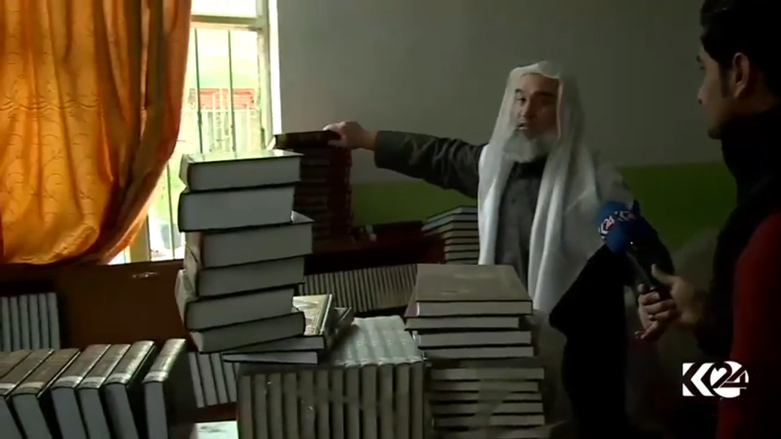 بالصور.. ماذا فعل داعش بملايين الكتب في الموصل؟