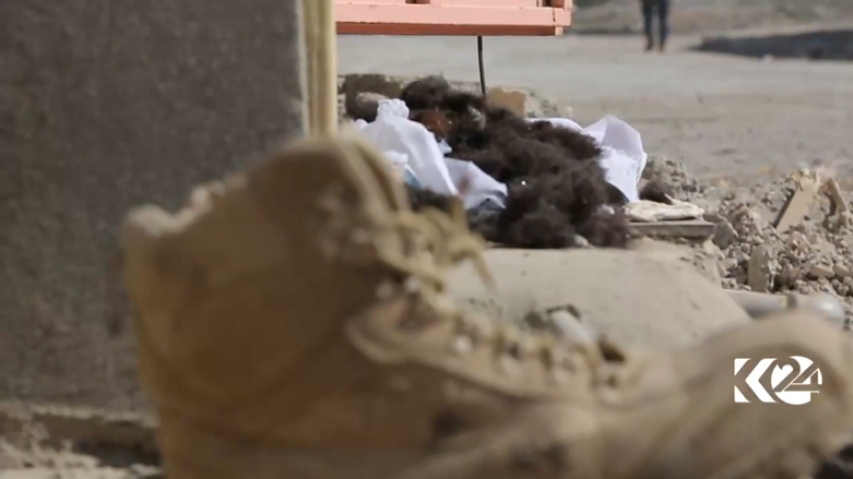 ذخائر وتجهيزات عسكرية وبقايا لحى.. هذا ما عثر عليه بمحيط مطار الموصل