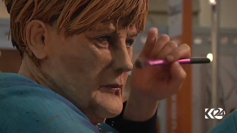 بالصور.. ترامب وميركل بمعرض حلويات بتركيا