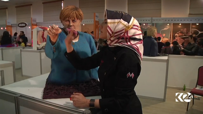 بالصور.. ترامب وميركل بمعرض حلويات بتركيا