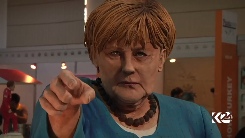 بالصور.. ترامب وميركل بمعرض حلويات بتركيا