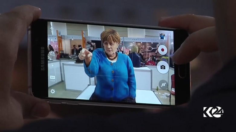 بالصور.. ترامب وميركل بمعرض حلويات بتركيا