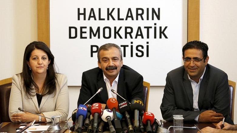 Pro-Kurdish politicians of the Peoples' Democratic Party (HDP) Sirri Sureyya Onder (C), Pervin Buldan (L), and Idris Baluken attend a news conference in Ankara, Turkey, June 12, 2015. (Photo: Reuters)