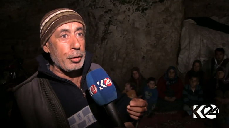(بالصور) مدنيون في كهوف عفرين.. وكوردي يصرخ: نحن باقون طالما بقيت زيتونة واحدة