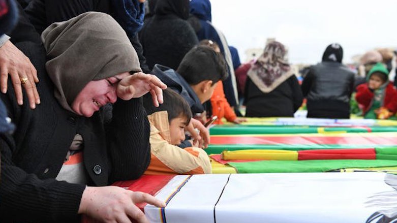 A woman mourns during the funeral of civilians and military personnel killed during the Turkish offensive against the enclave of Afrin, Syrian Kurdistan, Jan. 25, 2018. (AFP)