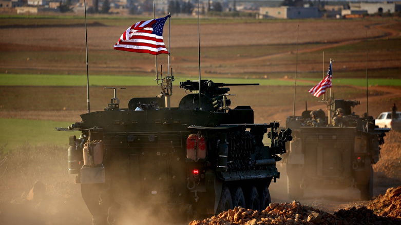 A convoy of US forces' armored vehicles drives near the village of Yalanli, on the western outskirts of the northern Kurdish-held town of Manbij, Syria, March 5, 2017. (Photo: AFP)